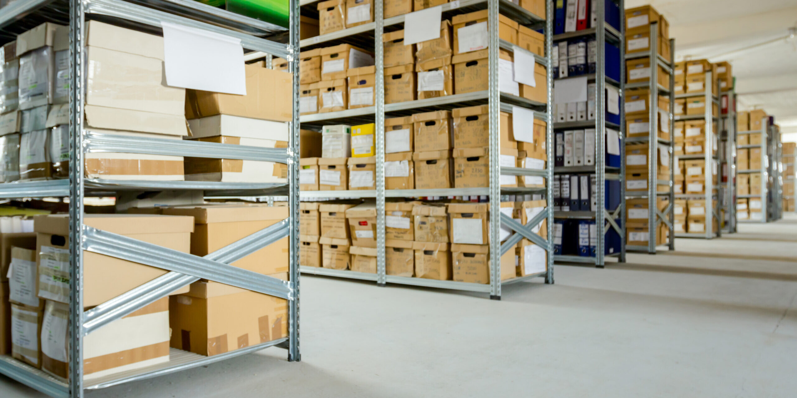 photo of numerous shelves filled with old boxes