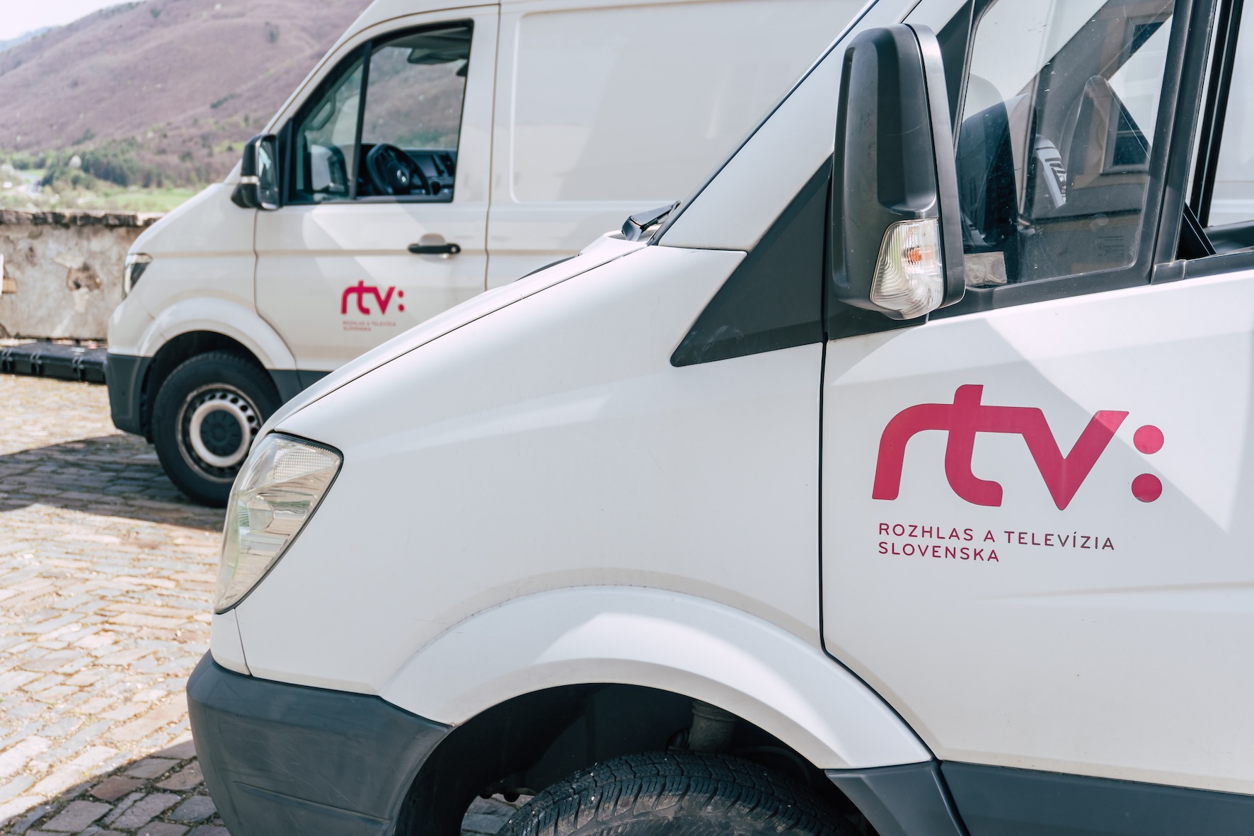 Logo of RTVS, the Radio and Television of Slovakia (Rozhlas a televízia Slovenska) on a door of a car.