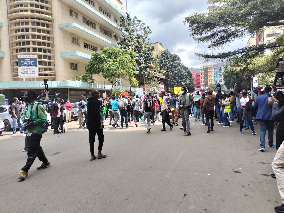 Image of a street in Nairobi with a large crowd.